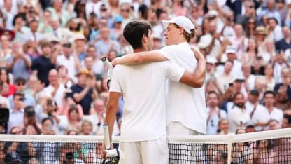 carlos and jinnik hug