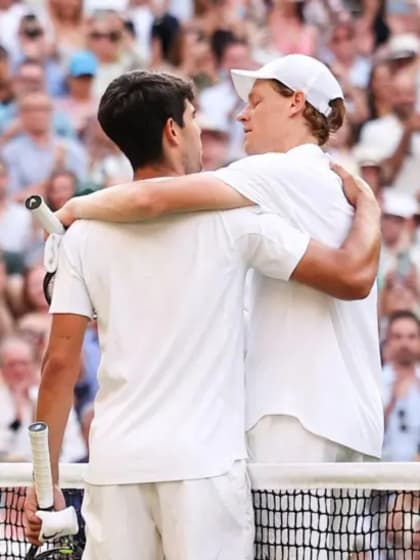 carlos and jinnik hug