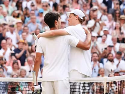 carlos and jinnik hug